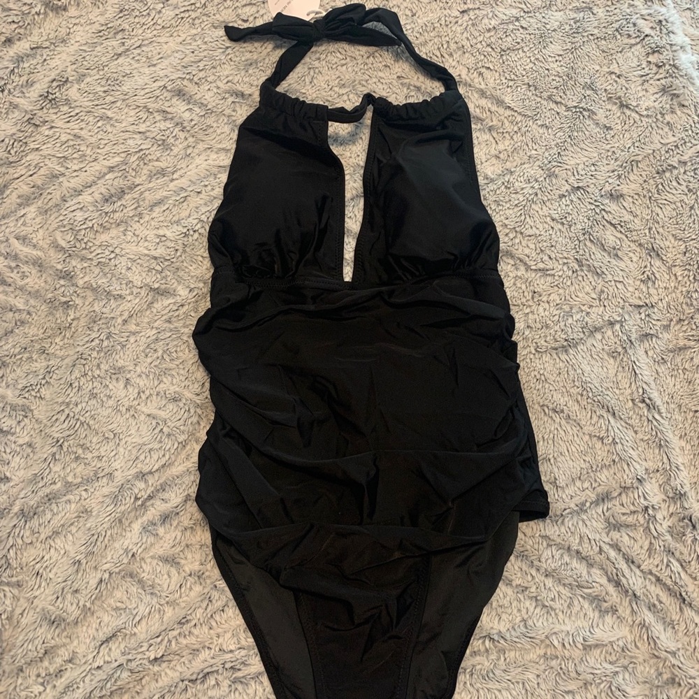 Black one piece, backless size L
